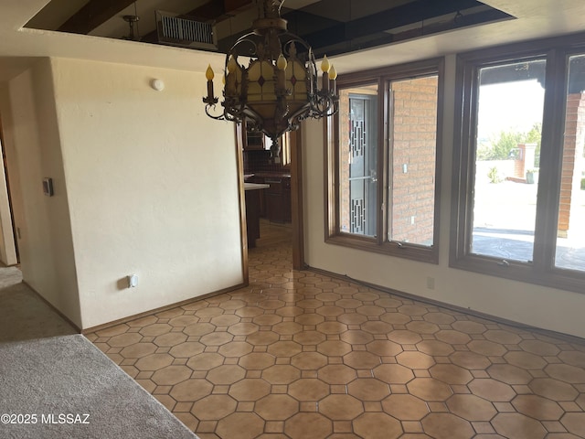 942 N Rancho Del Jefe Loop, Tucson, AZ 85748 - unfurnished dining area featuring a chandelier