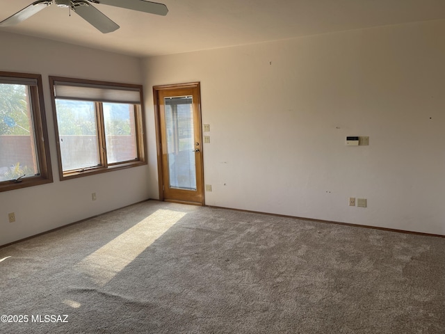 942 N Rancho Del Jefe Loop, Tucson, AZ 85748 - unfurnished room with ceiling fan, carpet, and baseboards