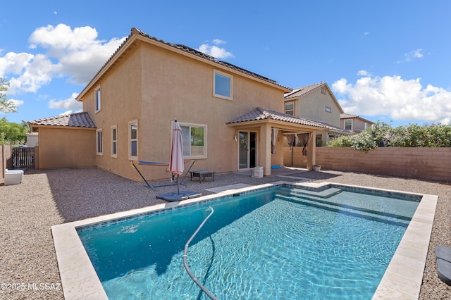 view of pool featuring a fenced in pool, a patio, and a fenced backyard