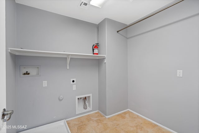 laundry area featuring laundry area, visible vents, gas dryer hookup, electric dryer hookup, and washer hookup