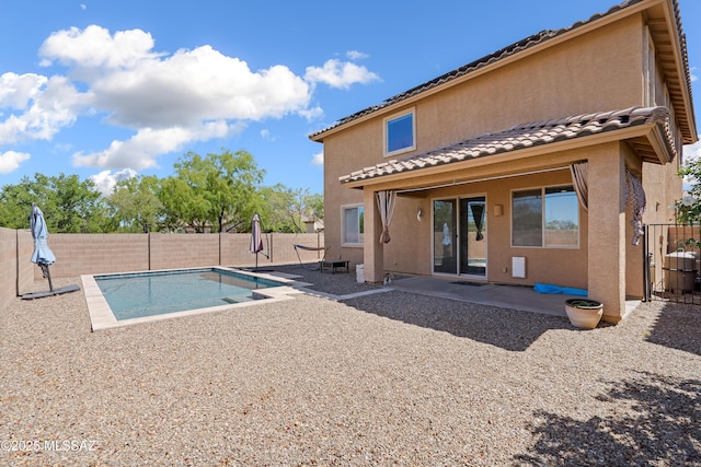 view of pool with a fenced backyard, a patio, and a fenced in pool