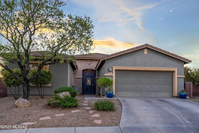 9224 S Big Tree Ln, Tucson, AZ 85756 - ranch-style home with stucco siding, driveway, and a garage