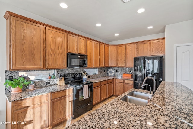 9224 S Big Tree Ln, Tucson, AZ 85756 - kitchen featuring black appliances, tasteful backsplash, a sink, and recessed lighting