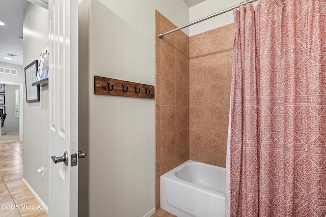 9224 S Big Tree Ln, Tucson, AZ 85756 - full bathroom with shower / bath combo with shower curtain, tile patterned floors, visible vents, and baseboards