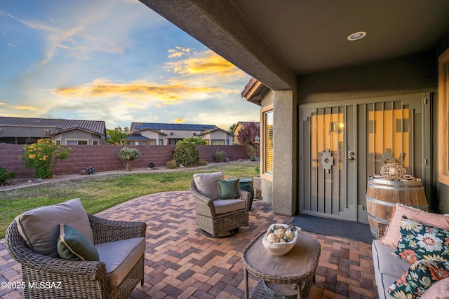 9224 S Big Tree Ln, Tucson, AZ 85756 - patio terrace at dusk with a yard and a fenced backyard