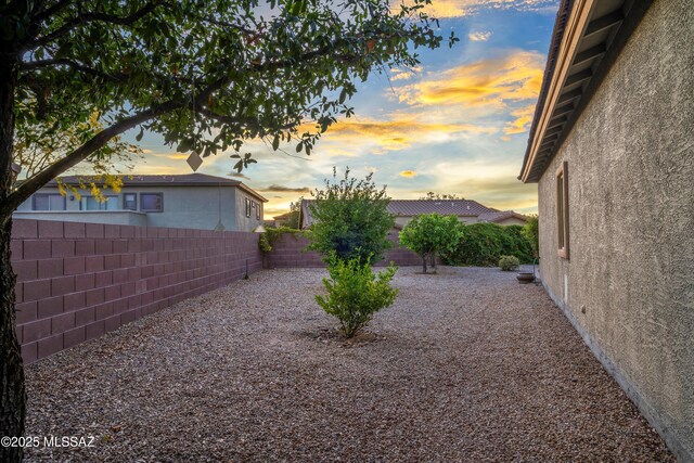 9224 S Big Tree Ln, Tucson, AZ 85756 - view of yard featuring a fenced backyard and a patio area