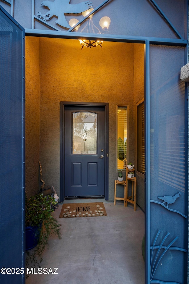 9224 S Big Tree Ln, Tucson, AZ 85756 - view of exterior entry featuring a porch
