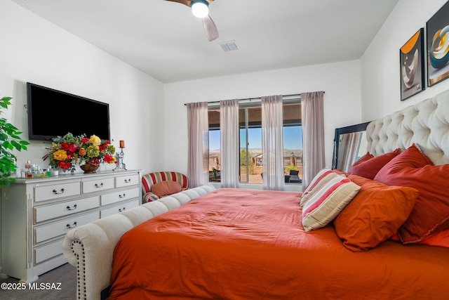 bedroom with carpet floors, a ceiling fan, access to exterior, and visible vents