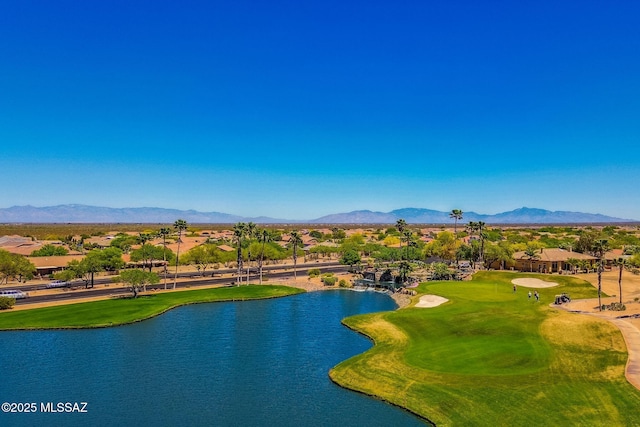 birds eye view of property with a water and mountain view, a residential view, and golf course view