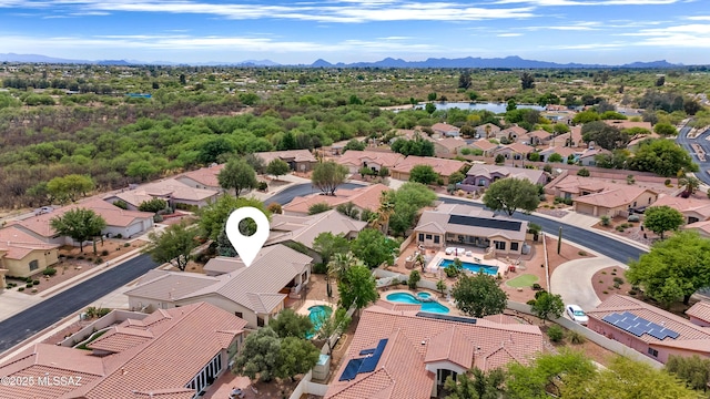 drone / aerial view with a residential view and a mountain view