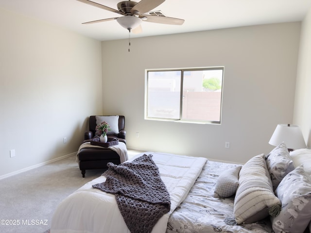 bedroom with carpet flooring, baseboards, and ceiling fan