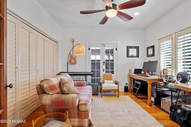 office area featuring recessed lighting, a ceiling fan, and light wood finished floors