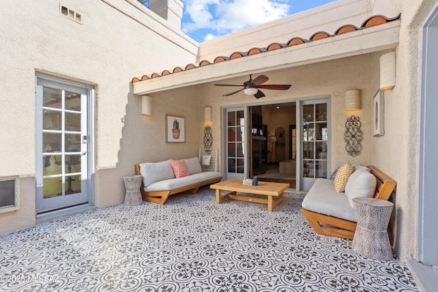 view of patio featuring a ceiling fan