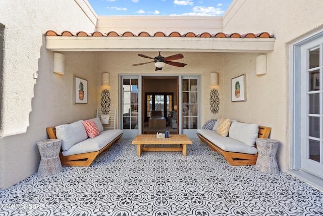 view of patio featuring ceiling fan and outdoor lounge area