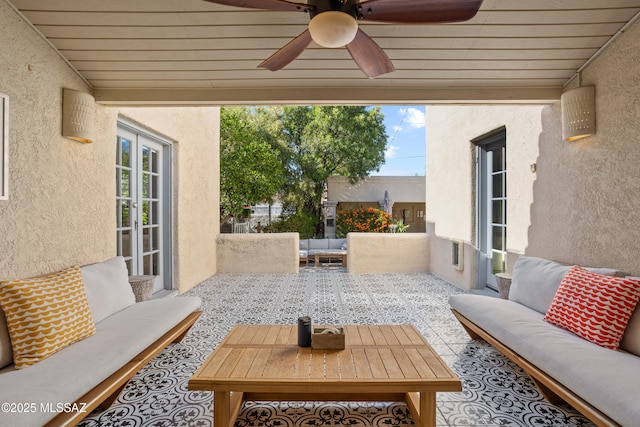 view of patio / terrace with ceiling fan and an outdoor hangout area