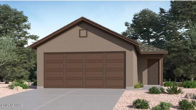 garage featuring concrete driveway