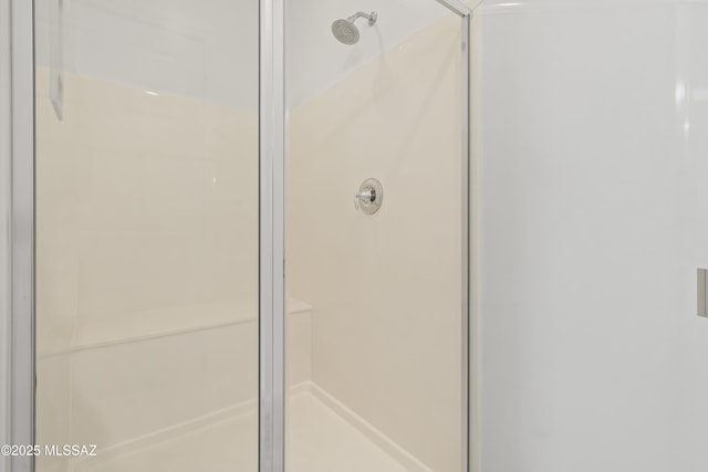 bathroom featuring a stall shower