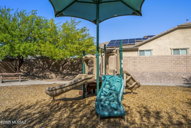view of play area with fence