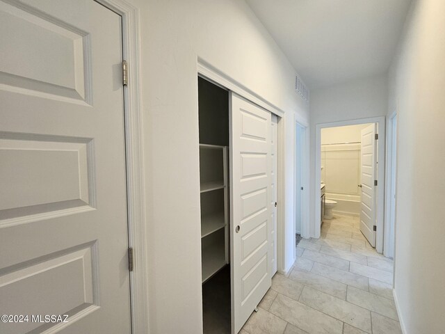 hall featuring visible vents