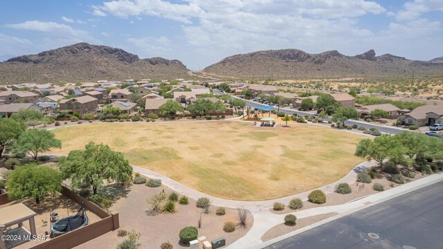 drone / aerial view featuring a mountain view and a residential view