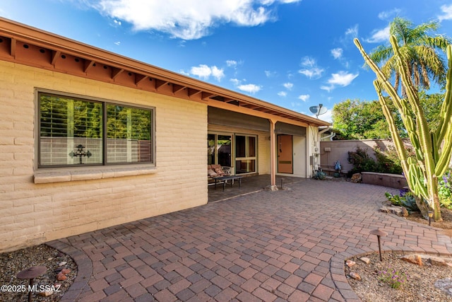 view of patio with fence