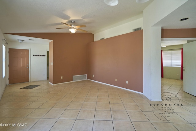 4703 W Gatehinge Ct, Tucson, AZ 85741 - empty room with a ceiling fan, light tile patterned flooring, and baseboards