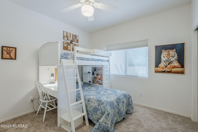 bedroom featuring carpet floors, baseboards, and a ceiling fan
