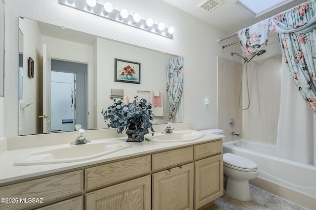 full bathroom featuring a sink, toilet, shower / bathtub combination with curtain, and visible vents
