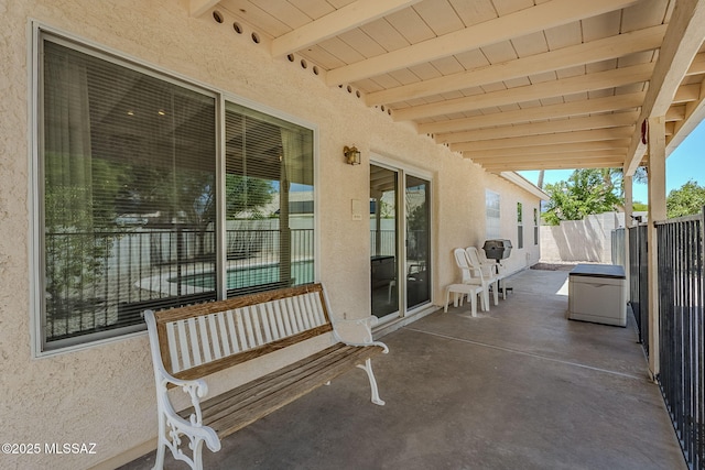 view of patio with fence