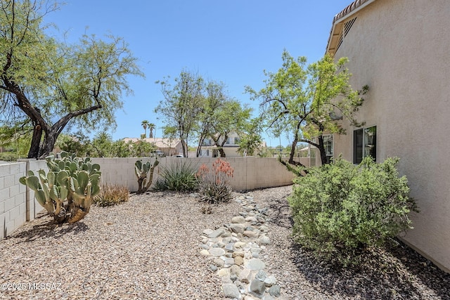 view of yard featuring a fenced backyard