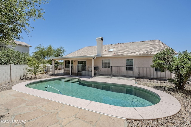 view of pool featuring a fenced in pool, a fenced backyard, and a patio