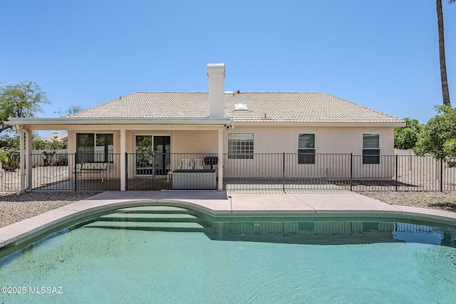 view of pool featuring a fenced in pool, a patio area, and fence