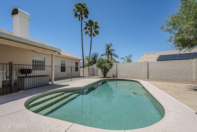 view of pool featuring a fenced in pool, a fenced backyard, and a patio