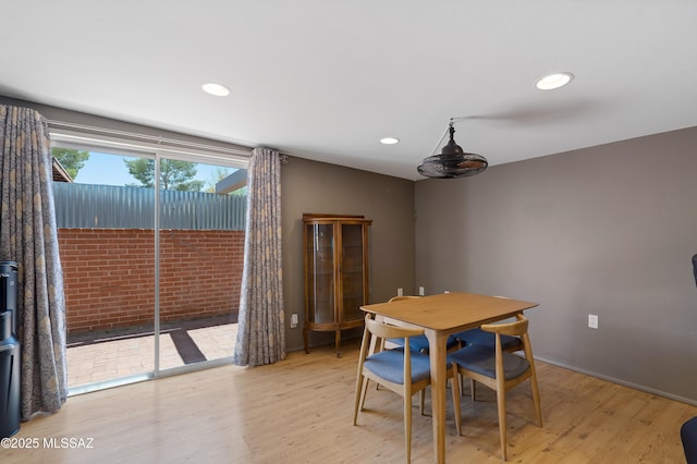 3202 W Calle Cereza, Tucson, AZ 85741 - dining space featuring baseboards, recessed lighting, and light wood-style floors