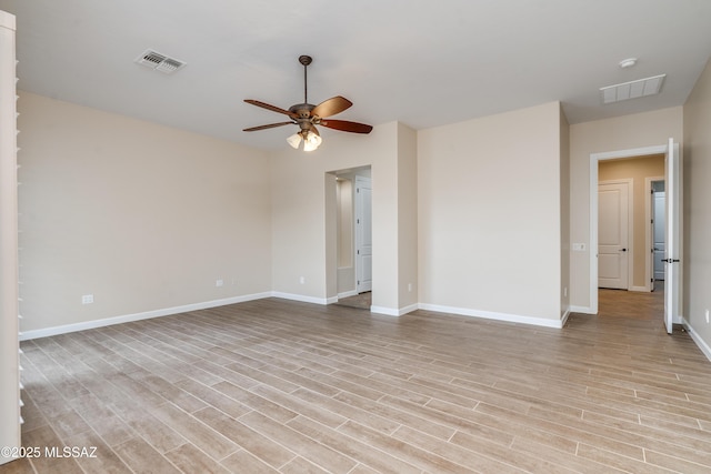 36330 S Desert Sun Dr, Tucson, AZ 85739 - unfurnished room featuring a ceiling fan, baseboards, and light wood finished floors