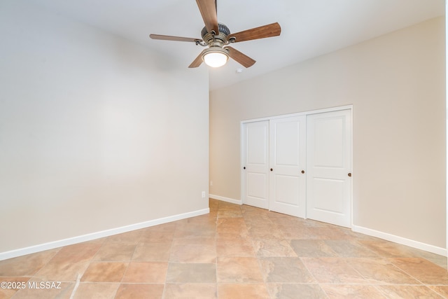 36330 S Desert Sun Dr, Tucson, AZ 85739 - unfurnished bedroom featuring a closet, ceiling fan, and baseboards