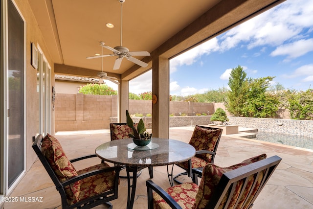 36330 S Desert Sun Dr, Tucson, AZ 85739 - view of patio with ceiling fan, outdoor dining space, and a fenced backyard