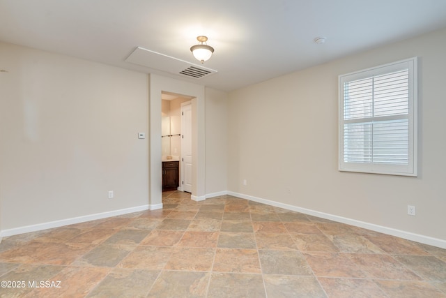 36330 S Desert Sun Dr, Tucson, AZ 85739 - unfurnished room with stone finish flooring and baseboards