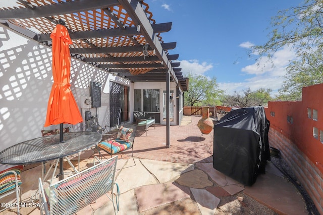 view of patio / terrace featuring a fenced backyard, a pergola, outdoor dining area, and grilling area
