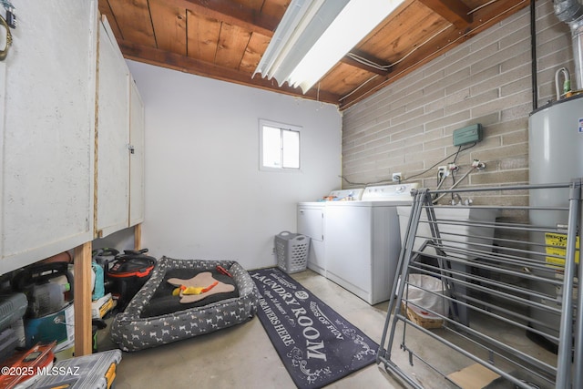 washroom with laundry area and washer and dryer
