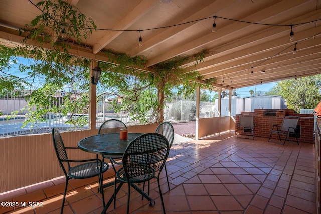 view of patio / terrace with a fenced backyard and outdoor dining space