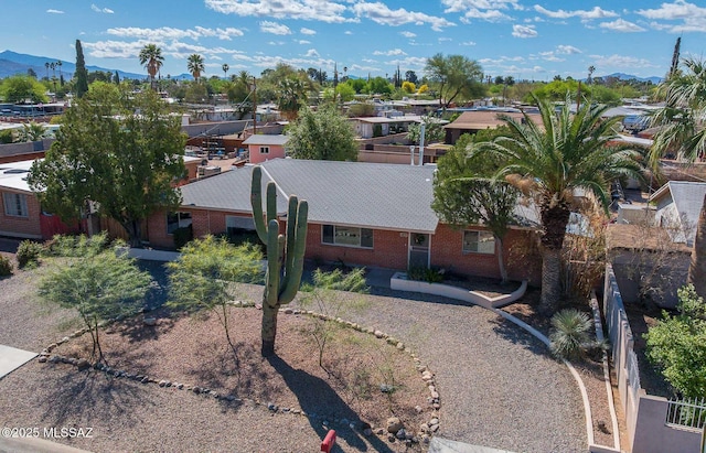 birds eye view of property featuring a residential view and a mountain view