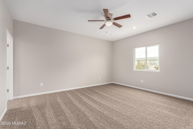 9008 W Bruce St, Tucson, AZ 85735 - carpeted empty room featuring ceiling fan, baseboards, and visible vents