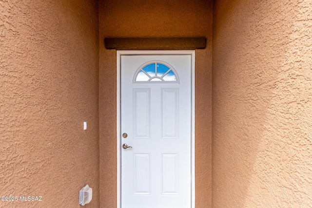 9008 W Bruce St, Tucson, AZ 85735 - view of exterior entry with stucco siding