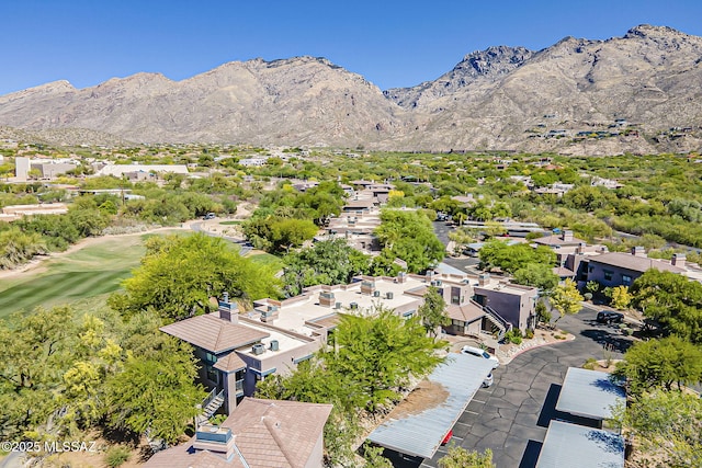 drone / aerial view with a residential view and a mountain view
