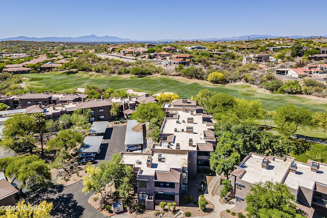 bird's eye view featuring a residential view, a mountain view, and view of golf course