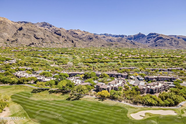 aerial view with a residential view, a mountain view, and golf course view