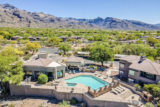 bird's eye view with a residential view and a mountain view