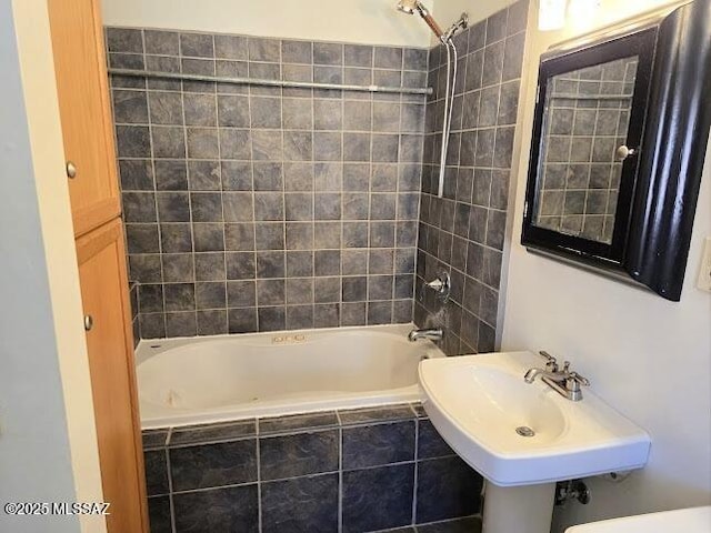 4743 E Scarlett St, Tucson, AZ 85711 - full bath with tiled shower / bath combo and a sink