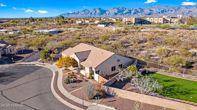 drone / aerial view with a mountain view and a residential view